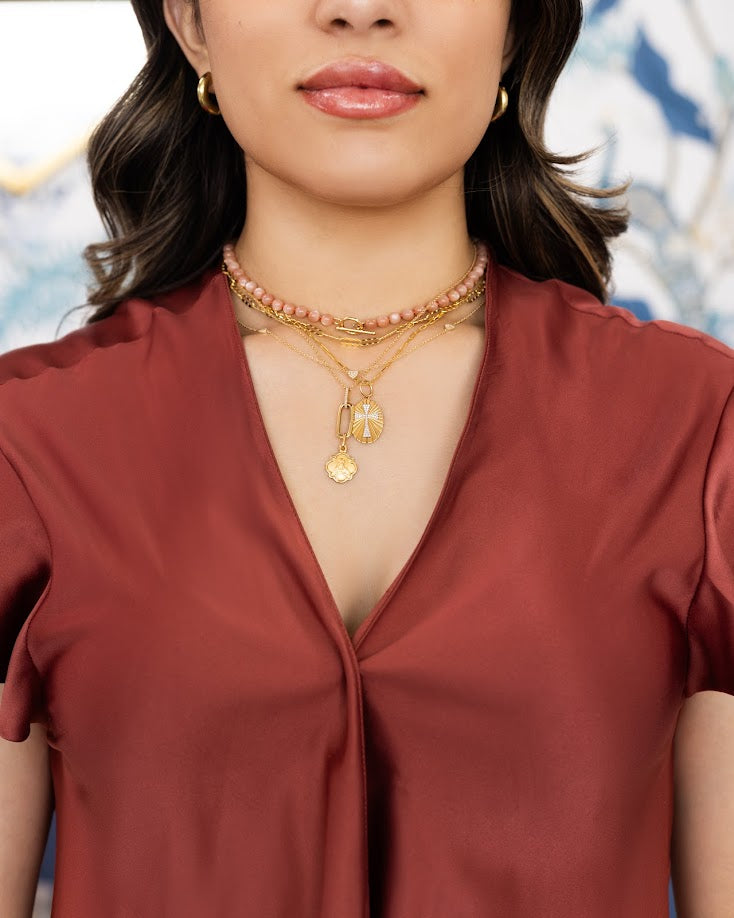 D0.10CT 14KY OVAL STRIPED CROSS PAVE CHARM