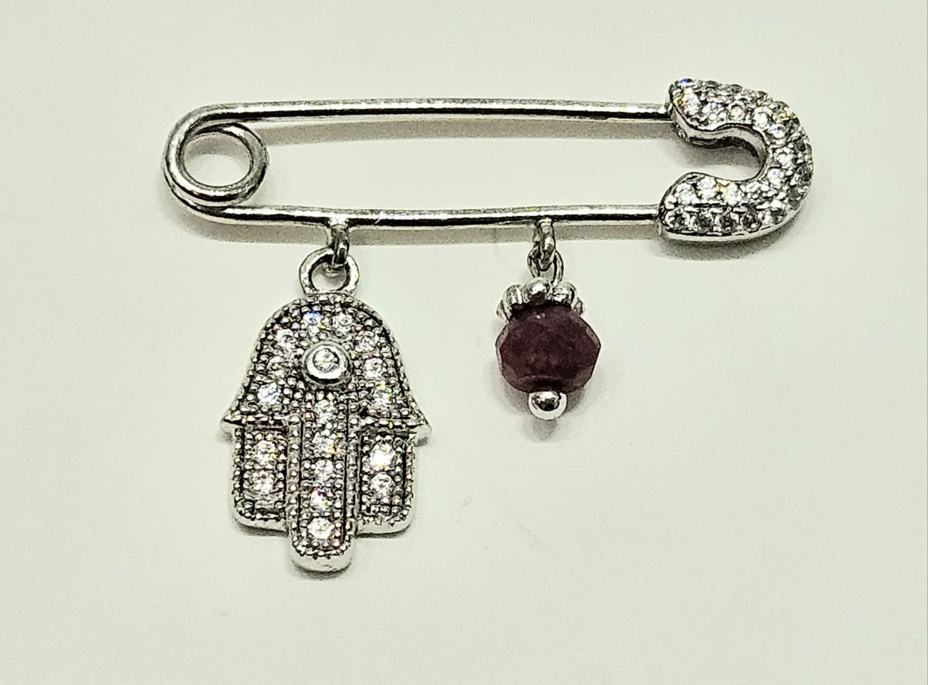 Dije de Hamsa y Rubí en Plata 925