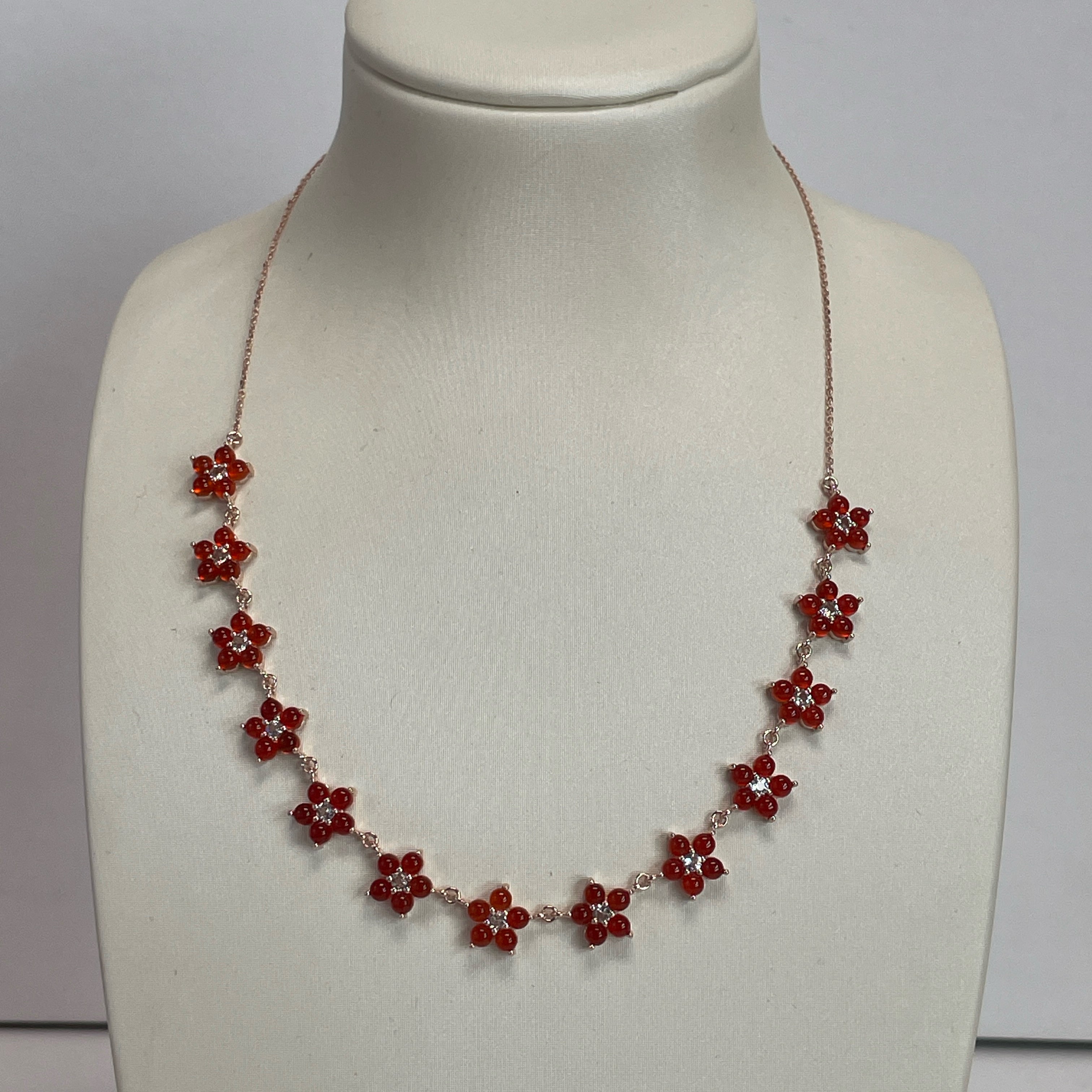 Collar Floral en Plata 925 Bañada en Oro Rosa con Ónix y Topacio