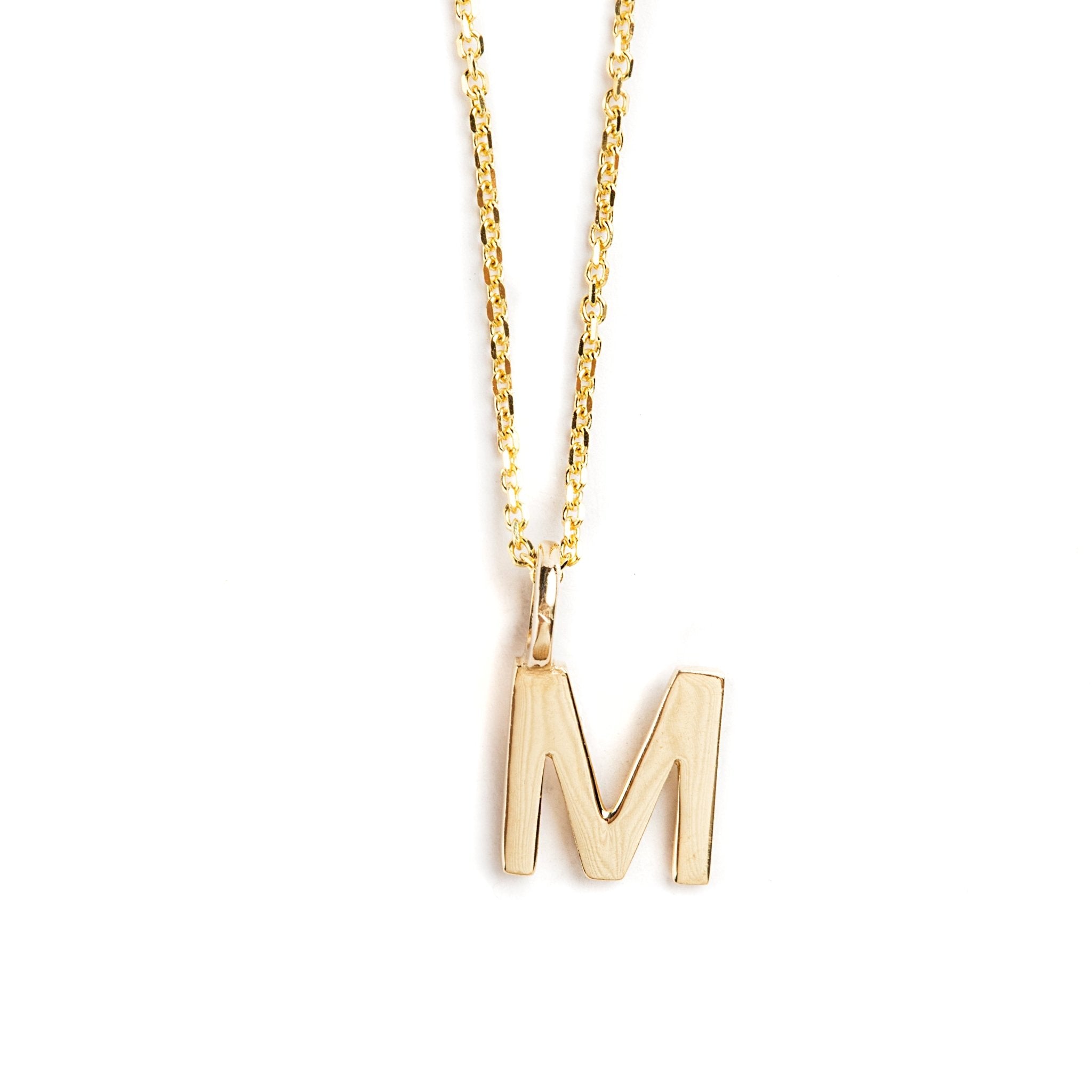 DIJE LETRA M DE ORO AMARILLO DE 14K - C'SANTOS